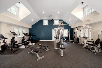 A spacious gym with a variety of exercise equipment. at Spa Cove Apartments, Annapolis, 21403